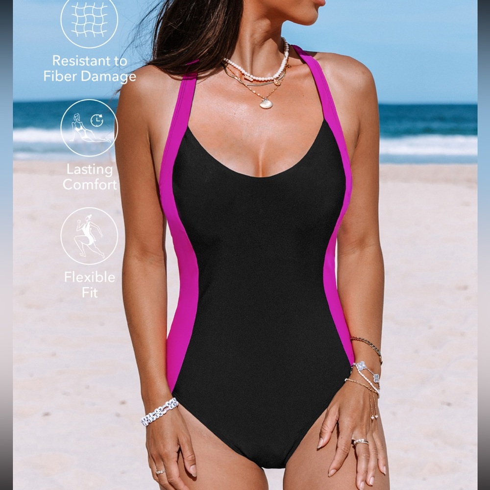 New with tags, black and fuchsia, lycra one piece swimsuit.